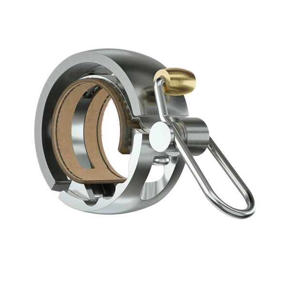 Knog Oi Luxe kerékpáros csengő ezüst színben