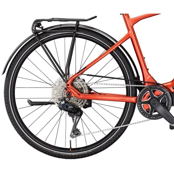 KTM Macina Sport SX 10 elektromos kerékpár narancs színben férfi vázzal